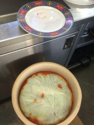 Cheesecloth is applied to keep all veggie fragments under the brine for proper
aneorobic bacteria growth.