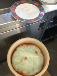 Cheesecloth is applied to keep all veggie fragments under the brine for proper
aneorobic bacteria growth.
